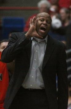 Oregon State head coach Craig Robinson yells at his players during the Beavers 64-47 loss to Arizona on Saturday afternoon in McKale Center. Robinson, the brother-in-law of U.S. president-elect Barack Obama, was ejected from the game.