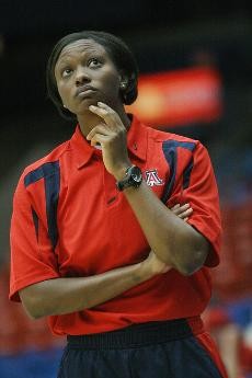 UA head coach Niya Butts looks toward the scoreboard during Arizonas annual Red/Blue intrasquad scrimmage on Oct. 29 in McKale Center. Butts, in her first year at the helm of the Wildcats, has yet to guide her team to a win in Pacific 10 Conference play.