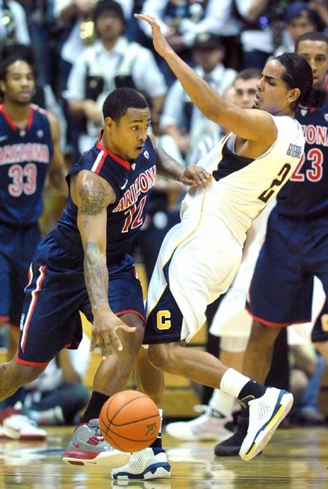 Arizonas Lamont Jones, left, tries to get past Cals Jorge Gutierrez, right, at Haas Pavilion in Berkeley, California, on Saturday, February 5, 2011. Arizona went on to win the game, 107-105, in overtime. 