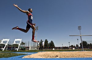 UA senior jumper Daniel Marshall soars through the air during the Jim Click Shootout at Drachman Stadium on Saturday. Marshall took third in the triple jump and Arizona finished in second place behind Nebraska in the weekend long event.