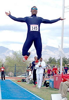 Senior Daniel Marshall flies through the air in the long jump at the Jim Click Shootout Saturday at Drachman Stadium. Arizona and California won the competition on behalf of the Pac-10 with a score of 513.50.