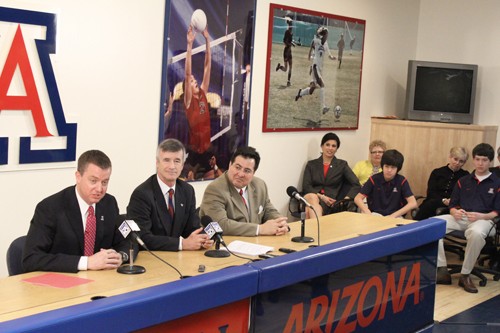 Lisa Beth Earle/ Arizona Daily Wildcat

Greg Byrne (left) formally announces his acceptance of  his new position as the next UA Director of Athletics at a press conference in the Lohse Room at the McKale Center on Wednesday, March 24. UA President Robert Shelton and Ernest Calder