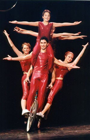 Members of the Russian American Kids Circus perform an acrobat stunt on stage. The kids are trained by professional veterans of the Moscow Circus.