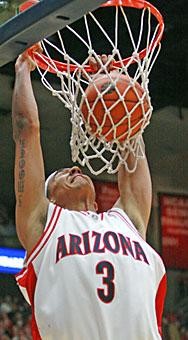 Arizona forward Marcus Williams dunks in the first half of Sundays 87-62 win over Houston. Williams posted his second double-double in a row, scoring 15 points and grabbing 12 rebounds. 