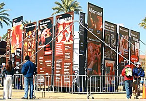 Five-foot-high pictures of aborted fetuses posted on the UA Mall sparked debates among passers-by all day Monday and yesterday. The exhibit was put together by Justice for All, a nonprofit organization that is providing an opportunity for students to voice their opinion by visiting campuses nationwide, said spokesperson Rebeccah Pedrick.