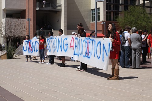 Will Ferguson/Arizona Daily Wildcat

Protesters against a proposed tuition hike and state cuts to education gathered in front of the UA Administration building on Wednesday. The rally was led by members of the Arizona Students Association. 