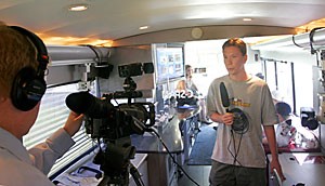 Political science freshman Matt Copek is interviewed by a C-SPAN representative yesterday afternoon in C-SPANs bus on the UA Mall. Copeks interview will be used as transitional piece between shows as the 2008 presidential elections draws.