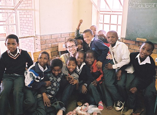 Andrew Hamilton, an Interdisciplinary Studies junior, spends time with underprivileged children in South Africa. Hamilton was in South Africa during some of the time he spent away from school for a TOMS shoes campaign to give pairs of shoes to children.