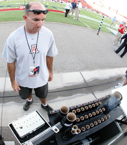Gordon Bates / Arizona Daily Wildcat

Ron Fuchs, warehouse manager of Fireworks Productions of Arizona in Chandler, Arizona, prepares his fireworks rig for the Wildcats team introduction at the UA vs Citadel game Saturday, Sept 11, 2010 at Arizona Stadium. Fireworks Productions of Arizona has been doing the fireworks displays at Arizona Stadium since 2001.