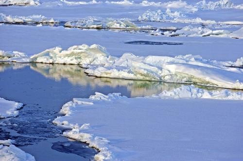 Experts say global warming from the burning of fossil fuels for energy raises many diplomatic, environmental and economic questions about the future of the Arctic.