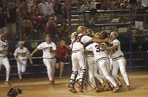 The Arizona softball team celebrates its 5-0 victory over Tennessee in Game 3 of the WCWS Wednesday night at ASA Hall of Fame Stadium. Wildcats pitcher Taryne Mowatt was named the tournaments Most Outstanding Player.