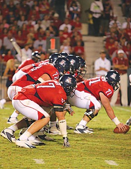 The offensive line will look slightly different this season compared to the group pictured here in a 20-16 loss to Stanford on Oct. 15 in Arizona Stadium. Redshirt freshman Eben Britton takes over for redshirt senior Tanner Bell at right tackle, but junior left tackle Peter Graniello will be protecting quarterback Willie Tuitamas blind side for the second consecutive year. 