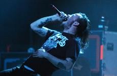 Lead Singer of the Cancer Bats band, Liam Cormier, rocks out at the Rialto Theater on Thursday as part of the Rockstar Taste of Chaos Tour.