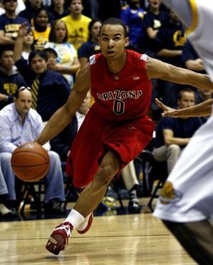UA guard Jerryd Bayless drives to the cup in a 79-75 win over California in Berkeley, Calif., on Saturday. The Wildcat credits part of his intensity to former NBA guard Frank Johnson.