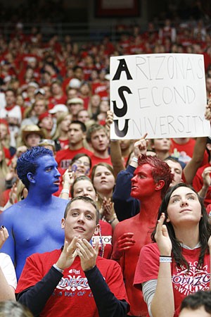 Members of the Zona Zoo show their displeasure for in-state rival ASU during the 59-54 Sun Devil win in McKale Center Feb. 10. Zona Zoo is only working on minor adjustments to its ticket reservation policy for next year.