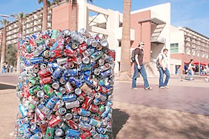 Aluminum cans clutter the UA Mall Friday as part of the UAs Recycle Mania program. Students in residence halls compete against each other in a campus contest to decrease the amount of recyclables that end up in the trash.