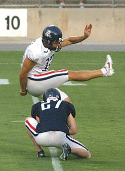 Kicking off the season for the Wildcat football team will be senior kicker Nick Folk, here attempting a 20-yard field goal during an Aug. 19 scrimmage. Folk has the leg to break the NCAA record for longest field goal, according to special teams coach Joe Robinson, but he would need the approval of head coach Mike Stoops to make an attempt. 