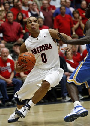 UA freshman guard Jerryd Bayless drives to the basket during a 68-66 loss to then-No. 5 UCLA in McKale Center March 2. Bayless announced Saturday he will forego his final three years of eligibility and will enter the June 26 NBA Draft.