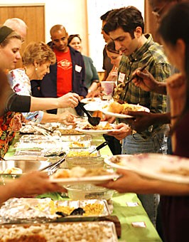A Thanksgiving dinner is served at the First United Methodist Church on Friday night. The diners included members of the International Students Association and church worshippers. 