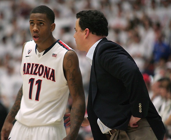 Arizona Wildcats head coach Sean Miller talks to freshman guard Josiah Turner in the closing minutes of the UAs 69-67 loss to the Washington Huskies on Saturday, January 28, 2012. Turner later attempted the game-tying put-back attempt, but could not convert as time ran out. 

Colin Darland / Daily Wildcat