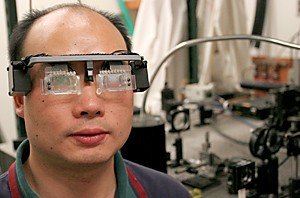 Jake Lacey /Arizona Daily Wildcat

Professor Nasser Peyghambarian and grad student Guoqiang Li developed glasses that change focus while on your face.