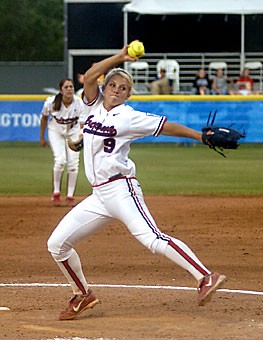 UA pitcher Taryne Mowatt winds up during the Arizona softball teams run to a second consecutive national title in June. Mowatt, one of the key returners for the Wildcats, and the rest of the team will begin the first of eight fall exhibition games tomorrow at Hillenbrand Stadium
