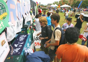 Students gather outside of seemingly endless rows of booths that house different cultural identities from all over the world, providing those in attendance a flavor of life in countries from Japan to Mexico.  