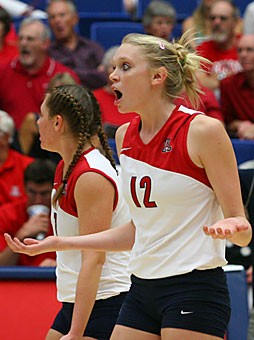 Freshman middle blocker Jacy Norton reacts to a questionable call in Arizonas 3-1 loss to ASU last Friday in McKale Center. Norton likely had a different reaction when she suffered a concussion from an incident with her alarm clock that may cause her to miss todays game at Stanford.