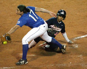 Freshman left fielder Brittany Lastrapes slides home after Creighton pitcher Amanda Hess threw a wild pitch in Arizonas 6-0 win over the Bluejays in the Wildcat Classic in Hillenbrand Stadium last night. The Wildcats will continue the tournament with doubleheaders against the La Salle and Creighton today and tomorrow.