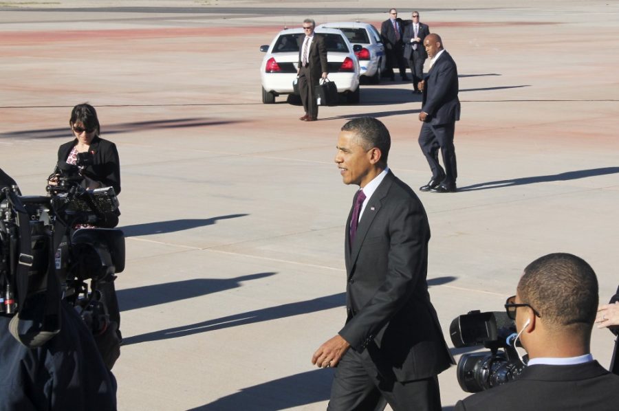 Stew McClintic / Daily Wildcat

President Obama exits the runway and greets the press after arriving in Mesa, Arizona to speak about job creation at the local Intel plant.