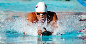 Junior Nicolas Nilo swims the breaststroke during the No. 3 mens teams win over Wisconsin on Nov. 2 at Hillenbrand Aquatic Center. The men and No. 4 women begin their grueling Christmas training over the break. 