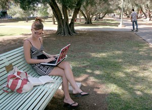 Daily Wildcat reporter and freshman majoring in pre-physiology and psychology, Kimberly Hill, spends some time studying near North Park Avenue, one of many studying hot-spots she tried out on and off campus.