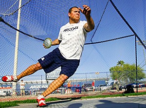 Arizona senior All-American thrower Sean Shields throws the discus during Saturdays tri-meet against ASU and NAU. After placing first in the shot put and second in the discus at the meet, Shields won Pacific 10 Conference Field Athlete of the Week honors this week.
