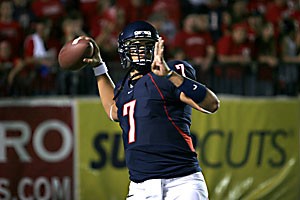 Quarterback Willie Tuitama rocks back in a 28-10 win against Stephen F. Austin on Sept. 16, 2006, at Arizona Stadium. In a season interrupted by multiple concussions, Tuitama threw for 1,355 yards and seven touchdowns in his sophomore season, but looks to have a much better year with a new pass-heavy offense.