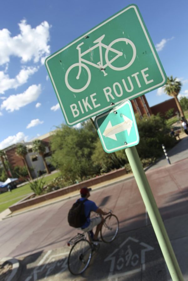 Mike Christy / Arizona Daily Wildcat

Cyclists and pedestrians navigate the bike paths and walkways along the UA Mall Tuesday, Aug. 31, 2010, in Tucson, Ariz. UAPD will begin cracking down on jay-walkers and bicyclists who fail to follow traffic laws on campus. 
