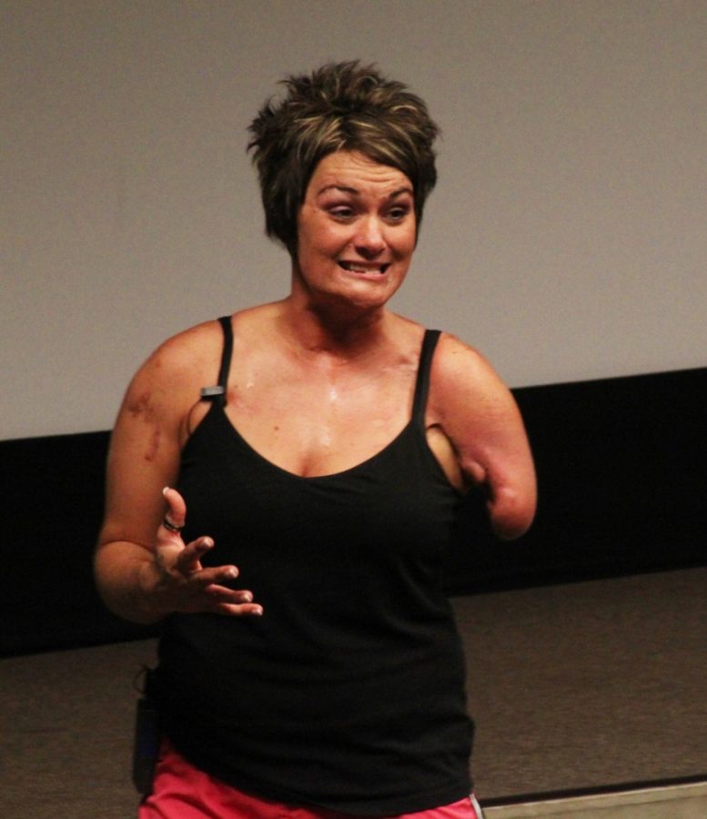 Sarah Panzau,a two-time Junior College All-American volleyball player who lost her arm in a drunk-driving accident, speaks to an audience at the Gallagher Theater on Thursday, Sept. 10 at the Student Union about how to avoid negative peer pressure and how to make good life choices. 