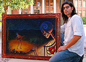 UA student Daniel Gonzalez shows off one of his finished works, evidently designed to be viewed with a Grateful Dead album on in the background.