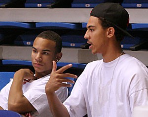 Phoenix high school student Jerryd Bayless, Class of 2007, with Marcus Williams, right, watches his team, Arizona Magic, play during the first day of the Arizona Cactus Classic in McKale Center, Friday, May 19.  Bayless didnt play due to an injury.