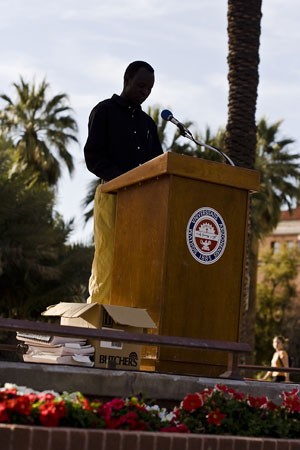 Abraham Deng Ater, public health masters student, speaks on the conflict in Sudan and on his own experiences on the UA Mall yesterday afternoon about escaping the devastated region.