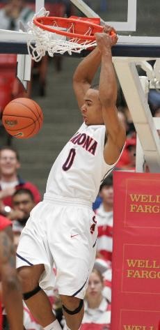 Arizona guard Jerryd Bayless dunks a ball in a 69-50 win over Fresno State on Dec. 16 in McKale Center. Bayless is developing more patience and maturity as a freshman.