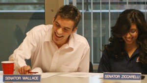 ASUA Sens. Stephen Wallace and Gabby Ziccarelli share a lighthearted moment during their weekly meeting Wednesday in the Student Union Memorial Center.