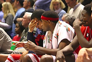 Arizonas Isaiah Fox sits dejected with Hassan Adams during the second half of Arizonas game at North Carolina, Saturday Ja. 28, 2006 at the Dean Smith Center in Chapel Hill, N.C. North Carolina beat Arizona 86-69.