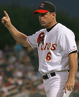 Former Wildcat Chip Hale, the manager of the Tucson Sidewinders, signals instructions to his squad Aug. 26 in the Tucson Toros 6-0 win over Tacoma, Wash., at Tucson Electric Park. Hale helped the Wildcats to their last baseball national championship in 1986, never missed a game in his collegiate career and led the Sidewinders to the playoffs.