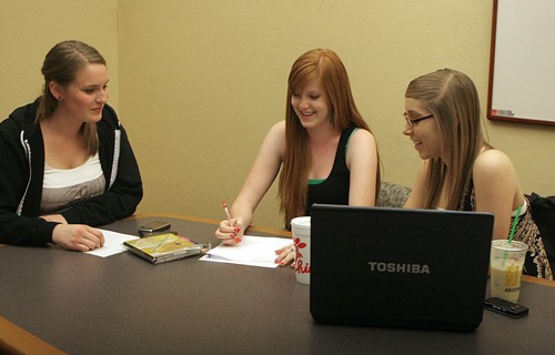 From left, Tavia Norheim, a pre-bussiness freshman, Carissa Forstie, a chemistry freshman, and Olivia Rose Doff, a pre-physiology freshman, design a logo in Posado San Pedro residence hall on April 21, 2010 for the new club DiabetiCATS, a support group for college students with diabetes.