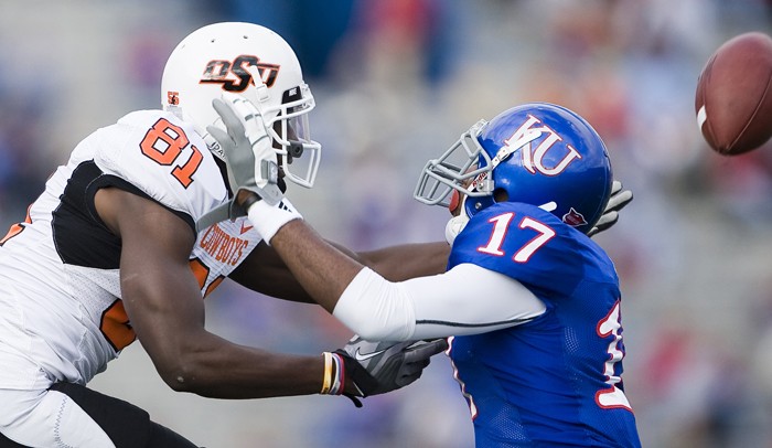 Oklahoma State wide receiver Justin Blackmon (81) tries to catch the ball as Kansas cornerback Calvin Rubles (17) is whistled for pass interference in the third quarter at Memorial Stadium in Lawrence, Kansas, on Saturday, November 20, 2010. Oklahoma State defeated Kansas, 48-14. (Shane Keyser/Kansas City Star/MCT)