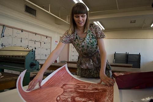 Morgan Anderson, a printmaking senior, works on a print in the School of Art on January 22, 2011. Many of Andersons pieces feature animal heads on human bodies.