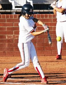 Arizona senior Jennifer Martinez hurls a pitch toward homeplate during a 9-0 UA win against Simon Fraser Tuesday at Hillenbrand Stadium. The Wildcats head to Fresno, Calif., this weekend for the Judi Garman Classic.