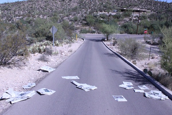 Lisa Beth Earle/ Arizona Daily Wildcat

Some of the missing Daily Wildcat papers lie crumpled spread across a road on Friday, Oct.8. About 10,000 copies were stolen from newsstands across campus on Thursday, Oct. 7 and only a few hundred have been found.