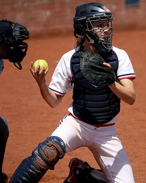Arizona catcher Callista Balko preps to return a pitch in a 13-1 win over Oregon State on Sunday at Hillenbrand Stadium. Balko, a senior, has been consistent for the Wildcats behind the dish, with a bat and in a leadership role.