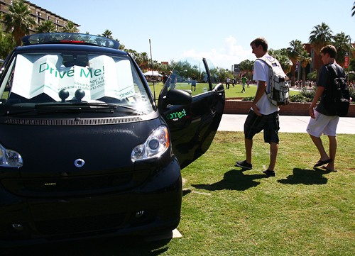 Gordon Bates / Arizona Daily Wildcat
As a form of advertisement, UA Parking and Transportation displays their Smart Car on the mall this Wednesday. Hertz car rentals, in cooperation with UA Parking and Transportation, facilitates Connect- an hourly car rental program that is available to UA students.